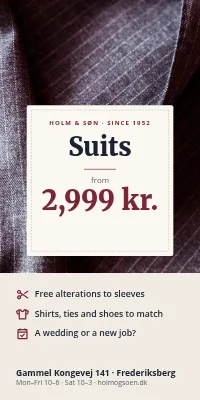 Door poster for a menswear shop — suits from 2,999 kr.